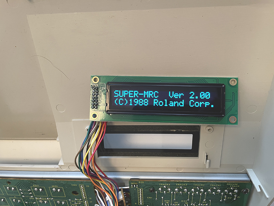 A picture of the Newhaven replacement OLED display component connected and powered on